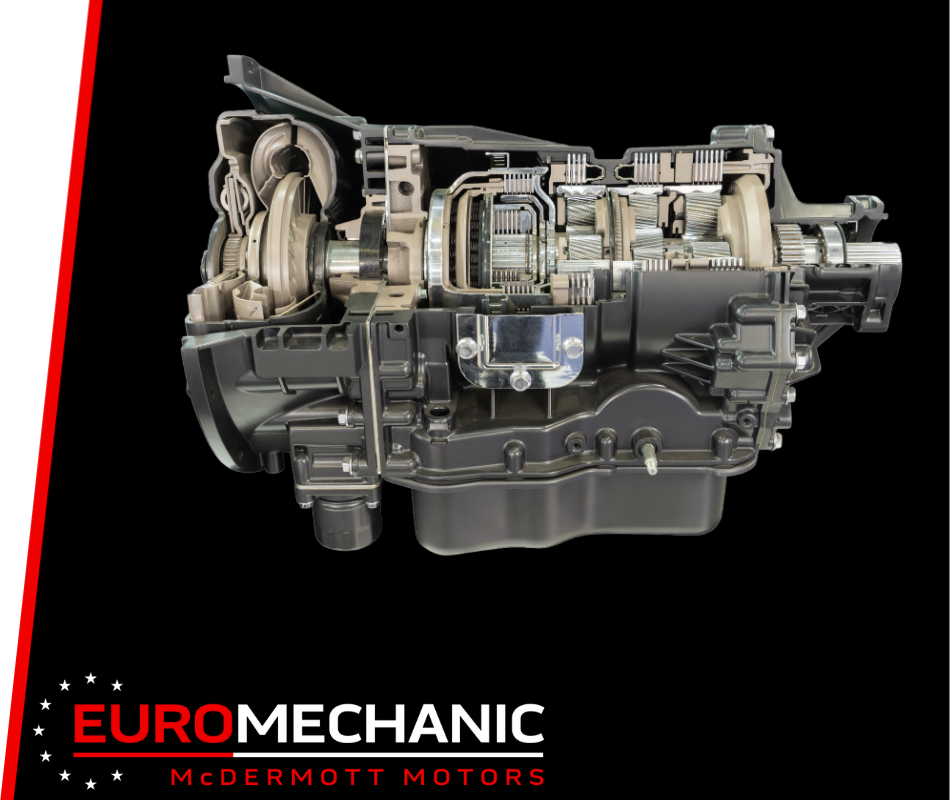 A cutaway view of a car transmission system reveals the intricate gears and structure, set against a black background. The red and white Euro Mechanic McDermott Motors logo is at the bottom left, highlighting its expertise in Transmission Repair Shop services near Bloor West Auto. Euro Mechanic | Bloor West Auto Repair Mechanics | Top Reviewed Auto Repair Shop in Mississauga | Visit bloorwestauto.ca