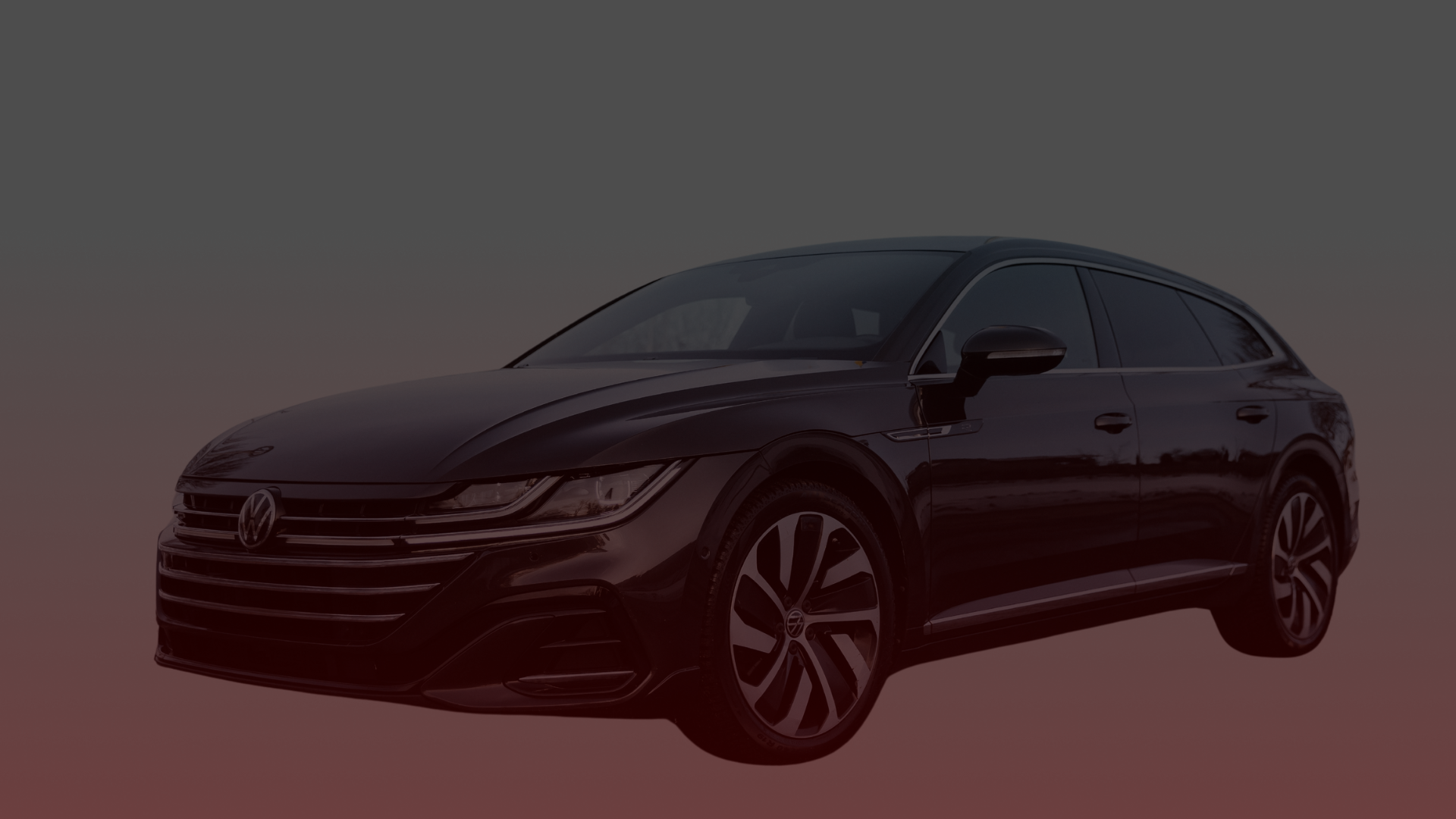 A sleek, black Volkswagen Arteon is showcased with sporty design features, including alloy wheels and modern headlights. Against a gradient from dark gray to reddish-brown, its the perfect symbol of style and performance. For expert care, consider visiting Volkswagen Repair at Bloor West Auto in Mississauga. Euro Mechanic | Bloor West Auto Repair Mechanics | Top Reviewed Auto Repair Shop in Mississauga | Visit bloorwestauto.ca