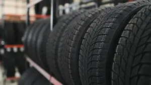 Properly stored summer tires on rims and unmounted tires arranged for winter storage in Mississauga